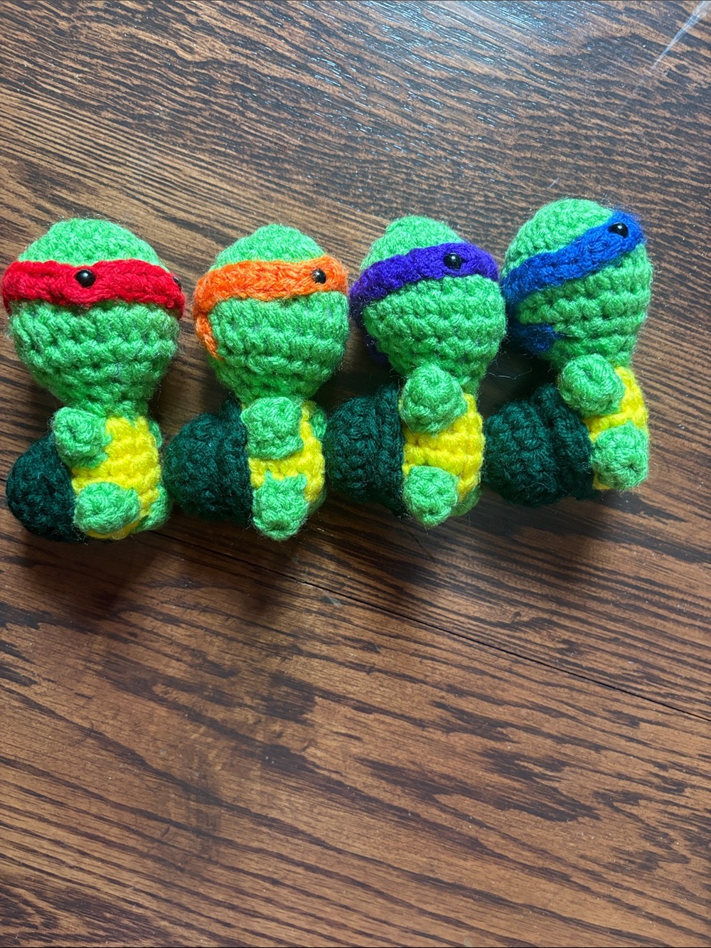 Cute Green Crochet Turtle Plush Set with Red, Orange, Purple & Blue Masks - Picture 4 of 5